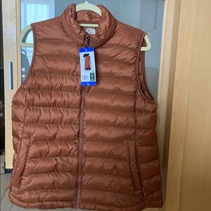 32 HEAT rust/orange vest L 8-10. New with tags